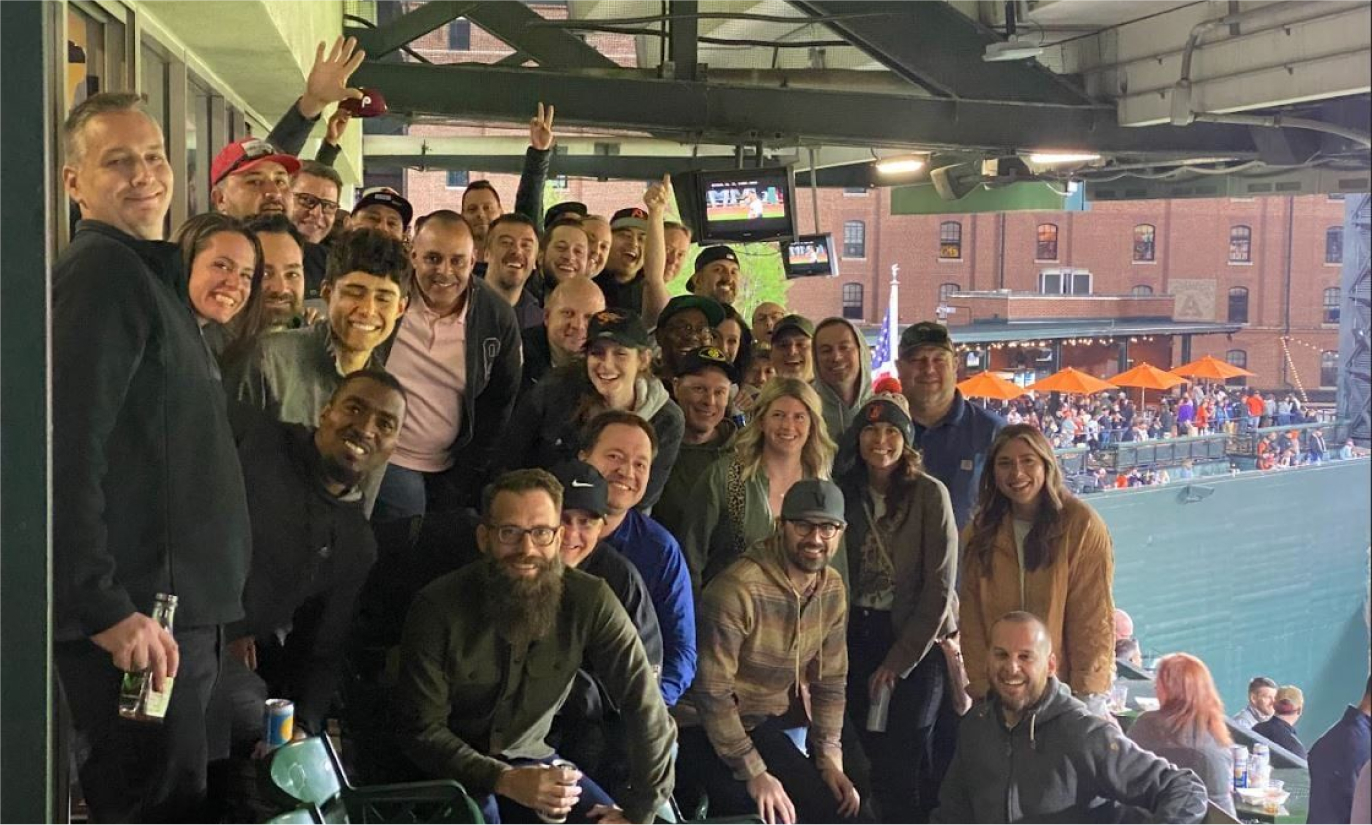 Group of People at a baseball game